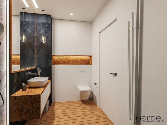 łazienka podłoga teak zabudowa ścianki wc dekoracyjna lampa wisząca przy umywalce